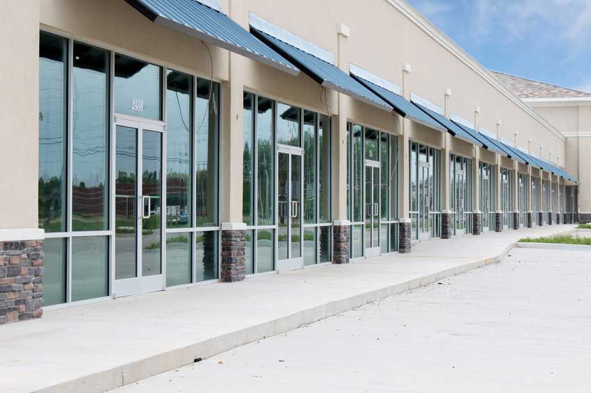 Commercial building with extensive glass windows and doors