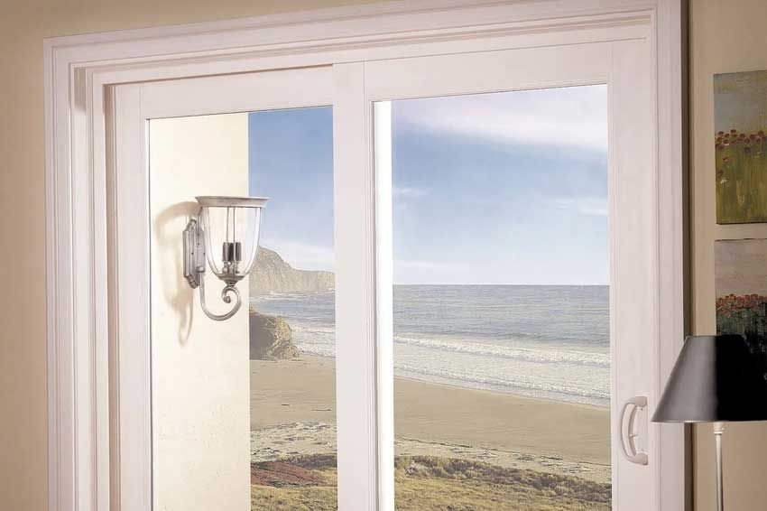 Sliding glass patio door with an ocean view, installed by G. Lurie Glass and Mirror